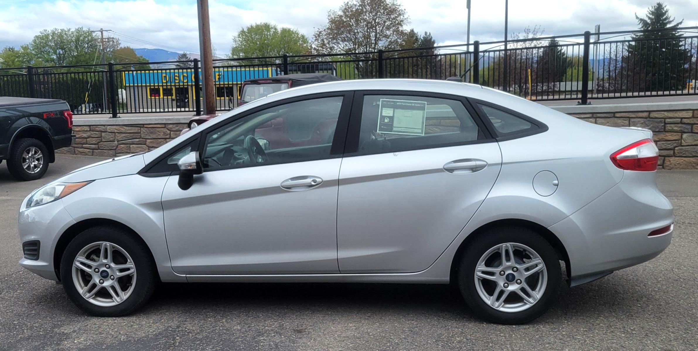 2019 Silver Ford Fiesta SE Sedan (3FADP4BJ2KM) with an 1.6L L4 DOHC 16V engine, Automatic transmission, located at 450 N Russell, Missoula, MT, 59801, (406) 543-6600, 46.874496, -114.017433 - Photo #4